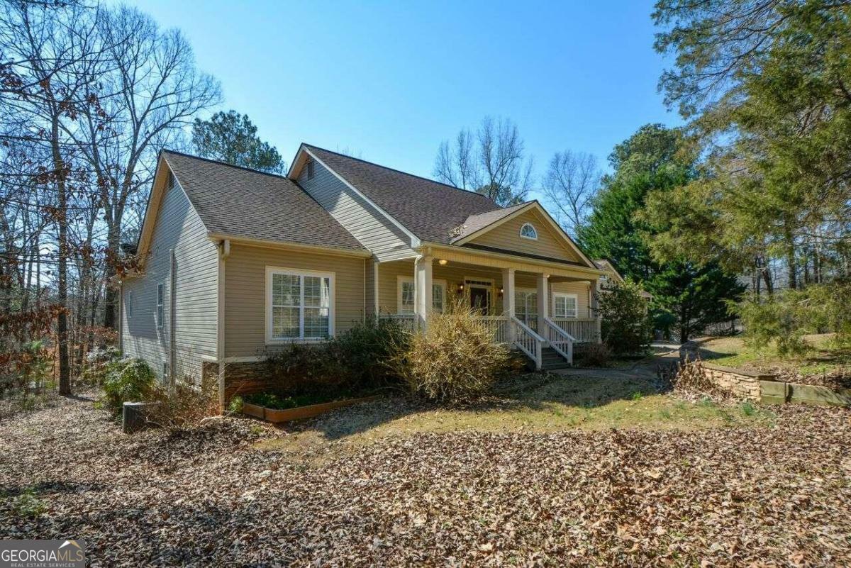 Property Photo:  6865 Cowan Mill Road  GA 30187 