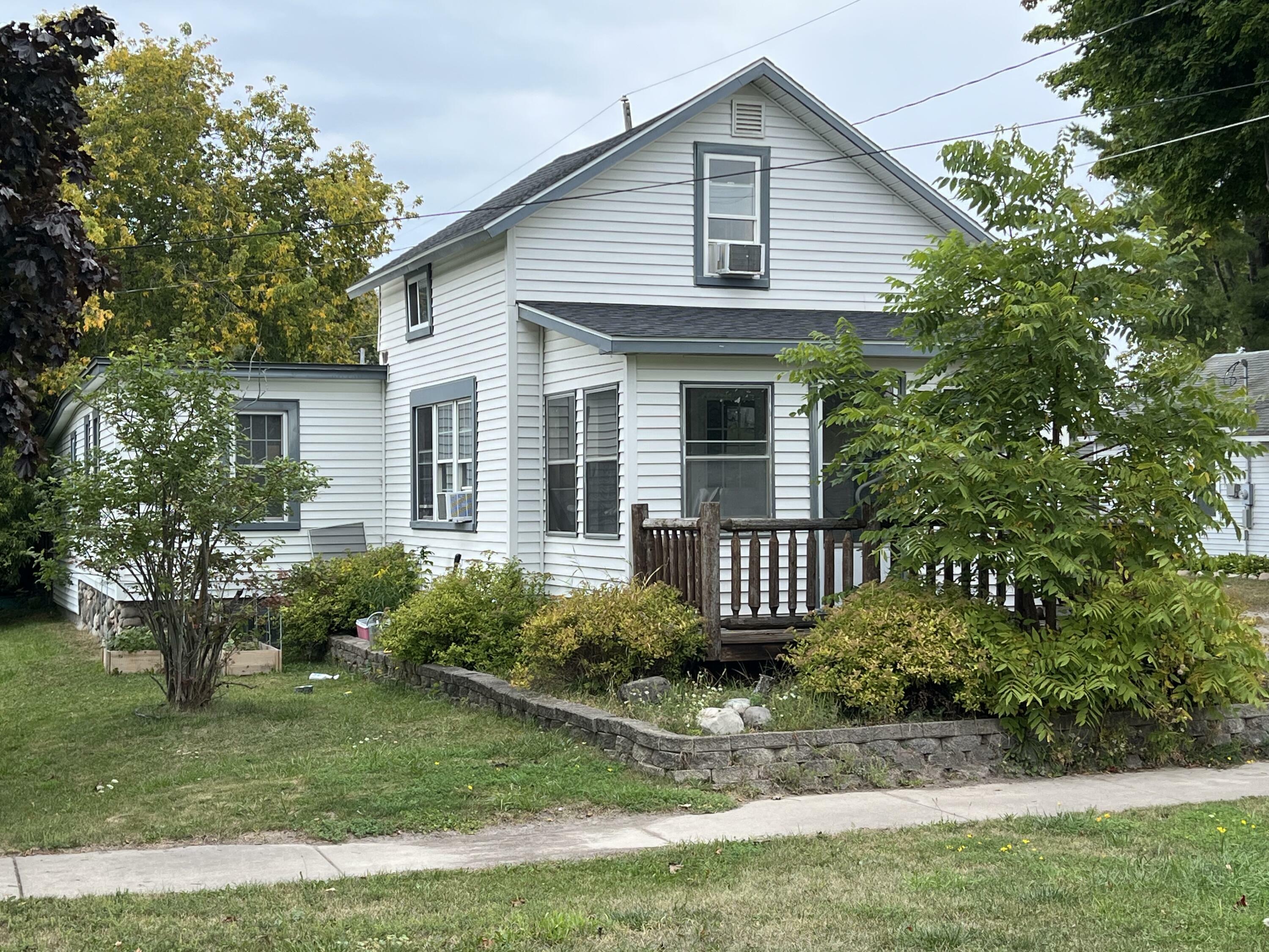 Property Photo:  611 Third Street  MI 49721 