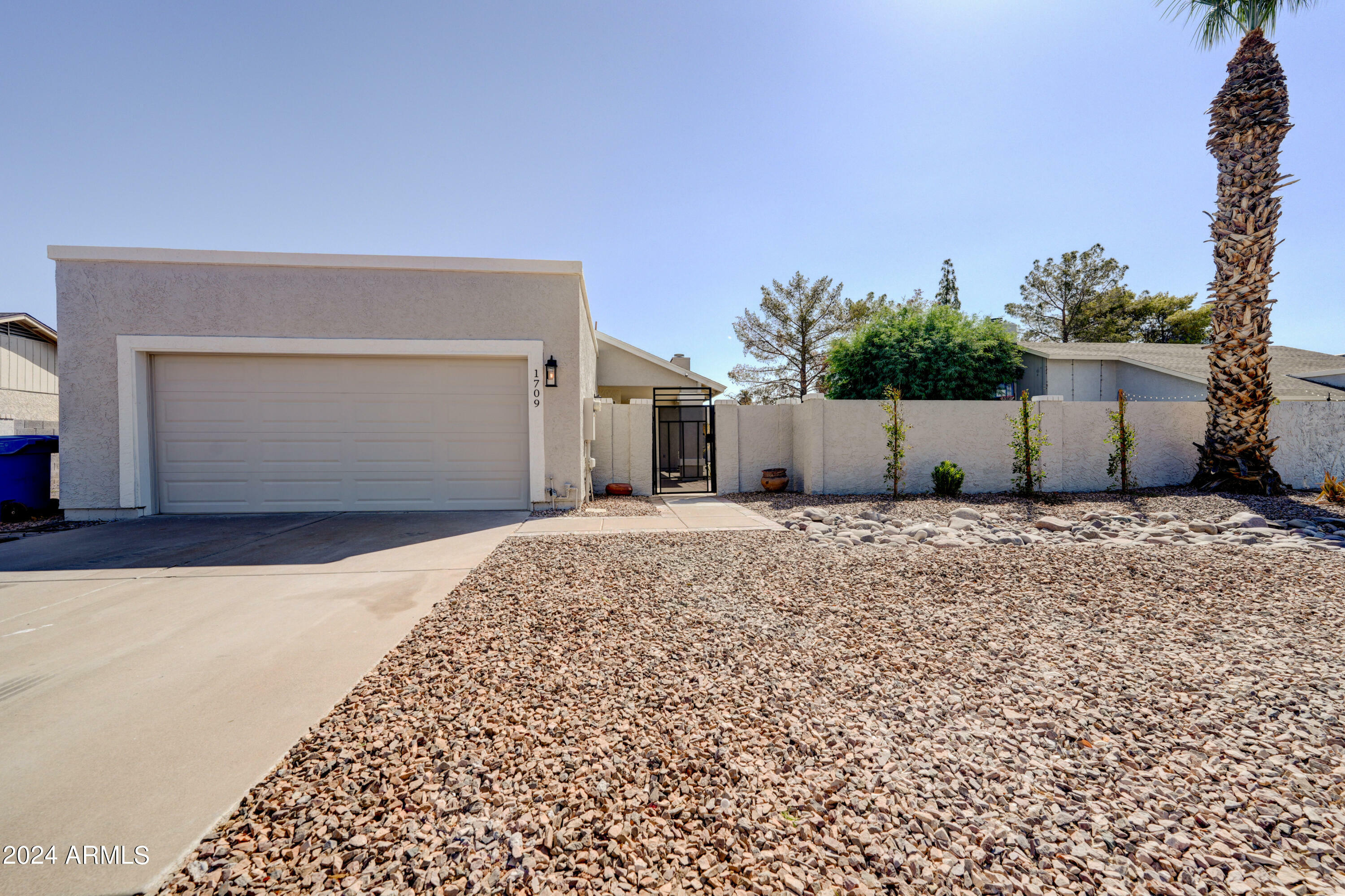 Property Photo:  1709 N Pleasant Drive  AZ 85225 