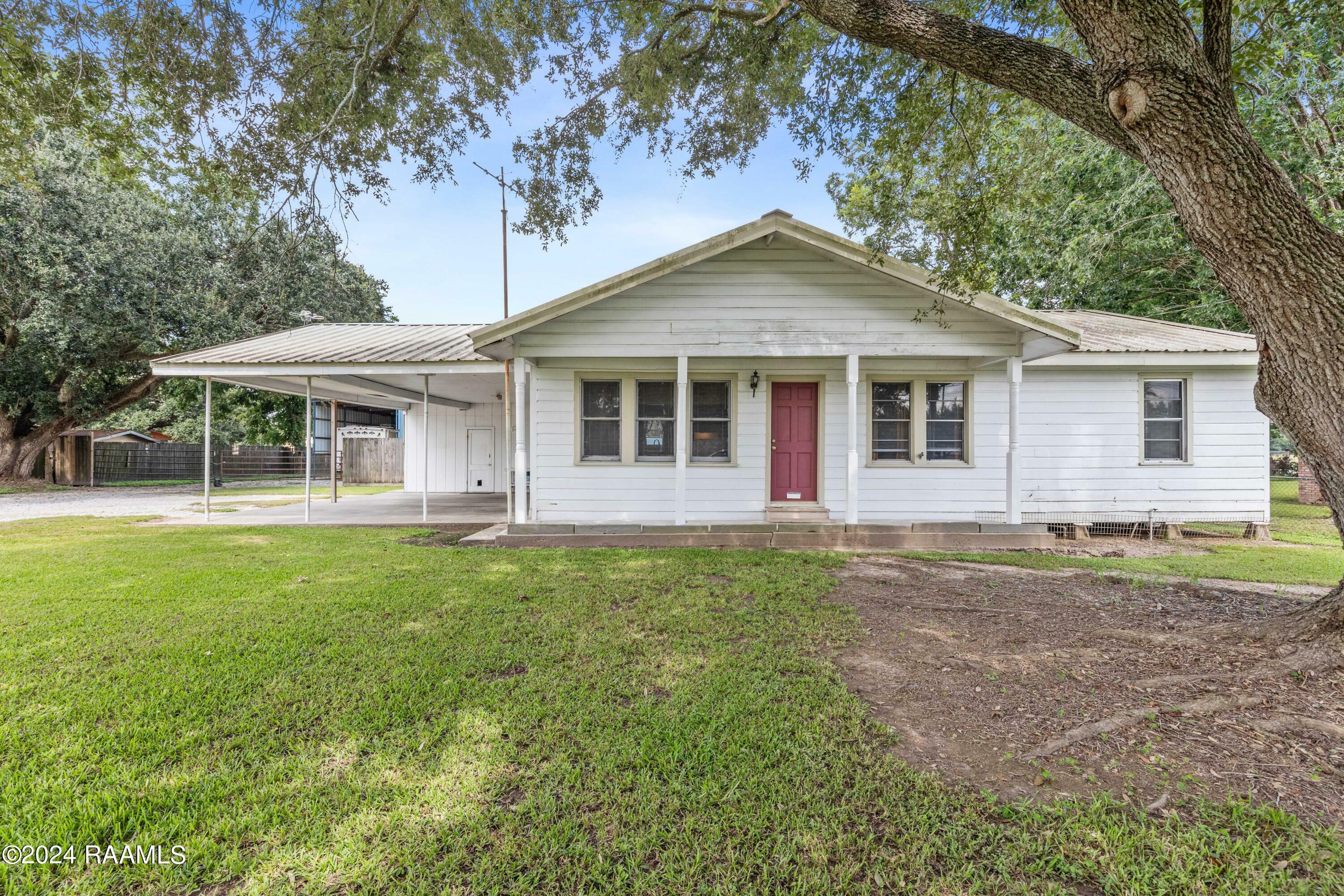 Property Photo:  129 E Broussard Road  LA 70503 