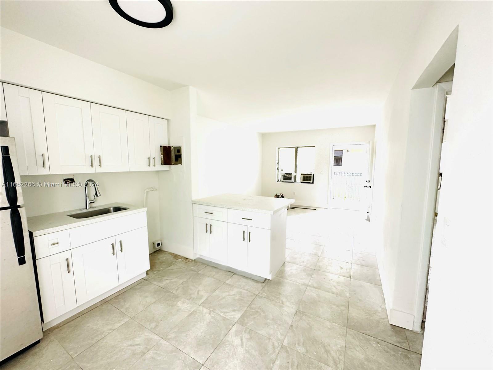 Property Photo:  171 NW 56th St  FL 33127 