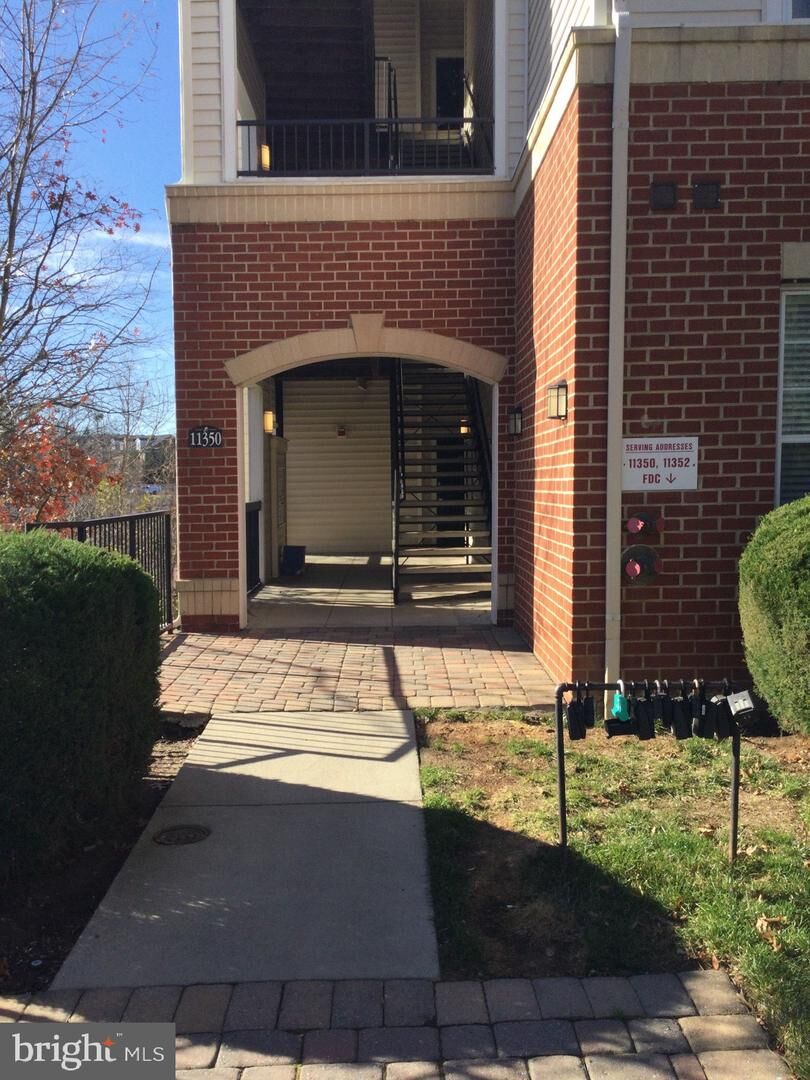 Property Photo:  11350 Aristotle Drive 7-203  VA 22030 