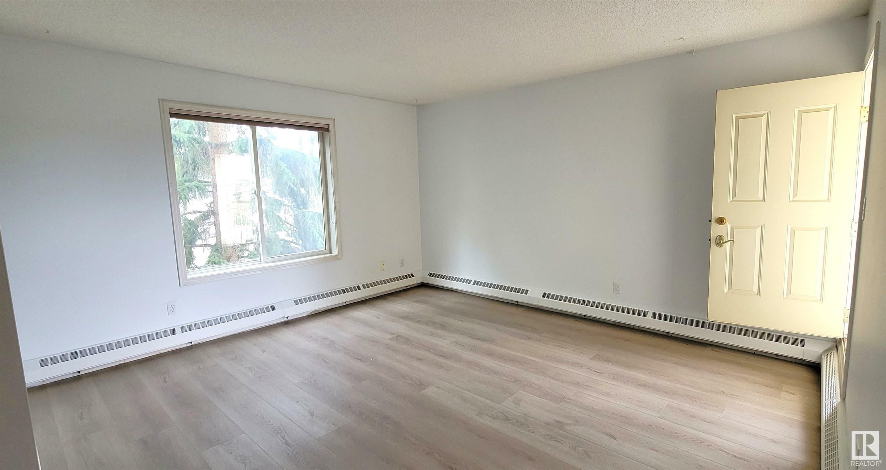 Property Photo:  18020 95 Avenue NW 214  AB T5T 5W3 