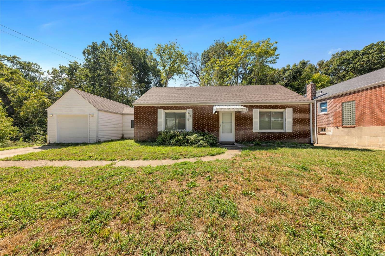 Property Photo:  6910 Roland Boulevard  MO 63121 