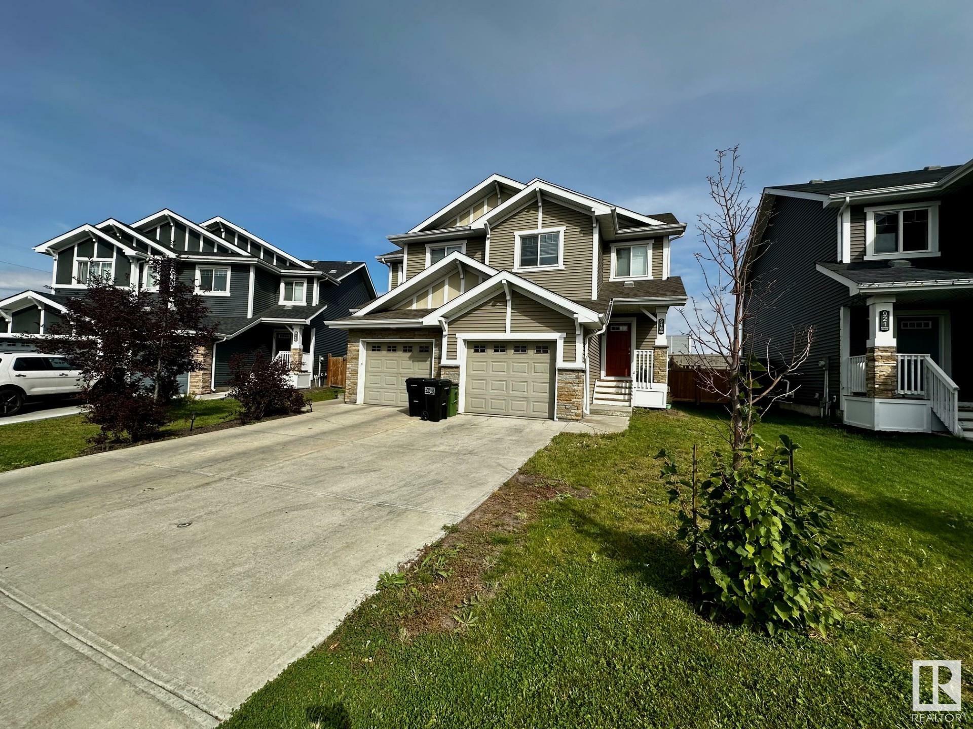 Property Photo:  919 Ebbers Crescent NW  AB T5Y 3V1 