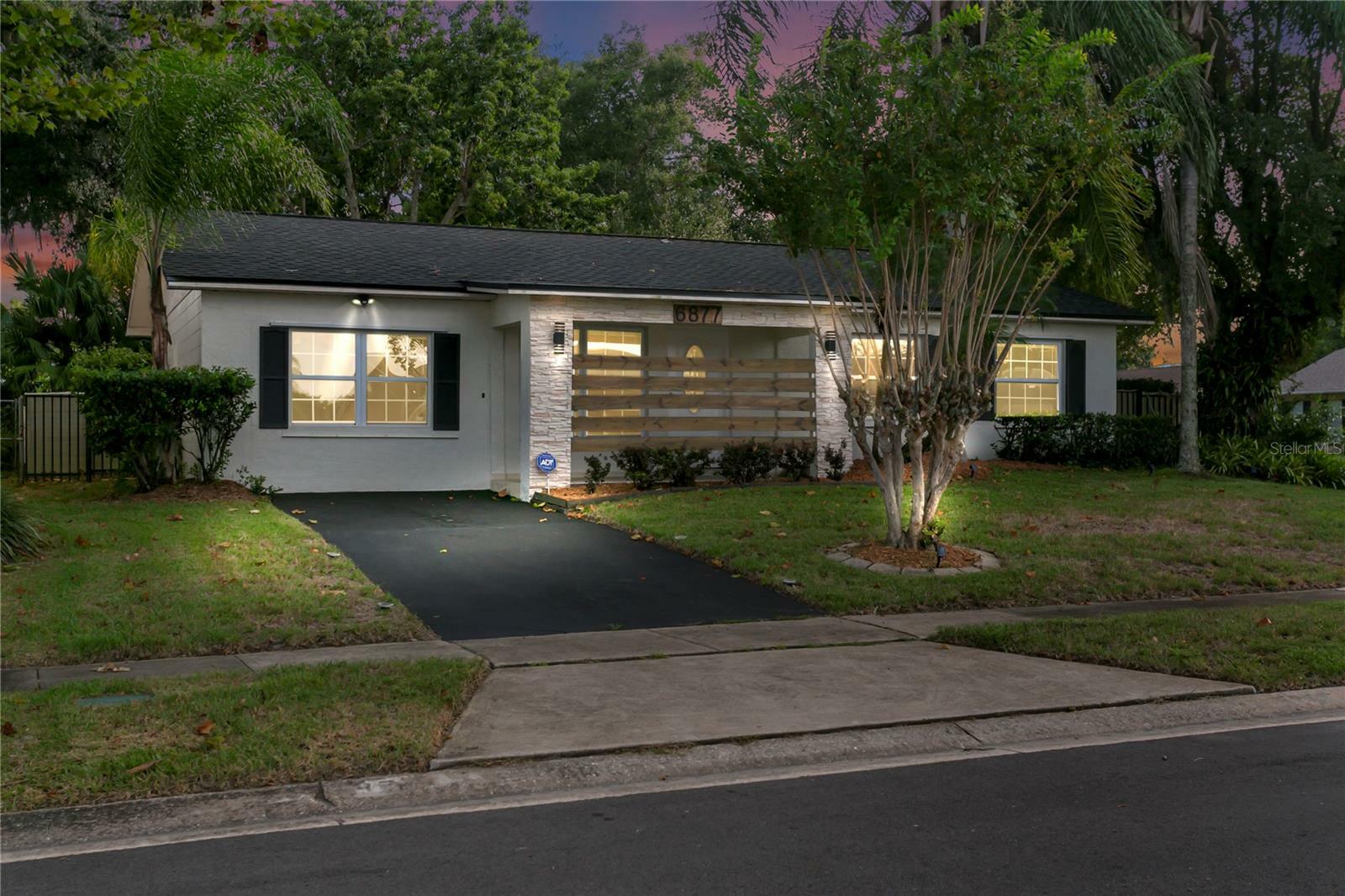 Property Photo:  6877 Firebird Drive  FL 32810 