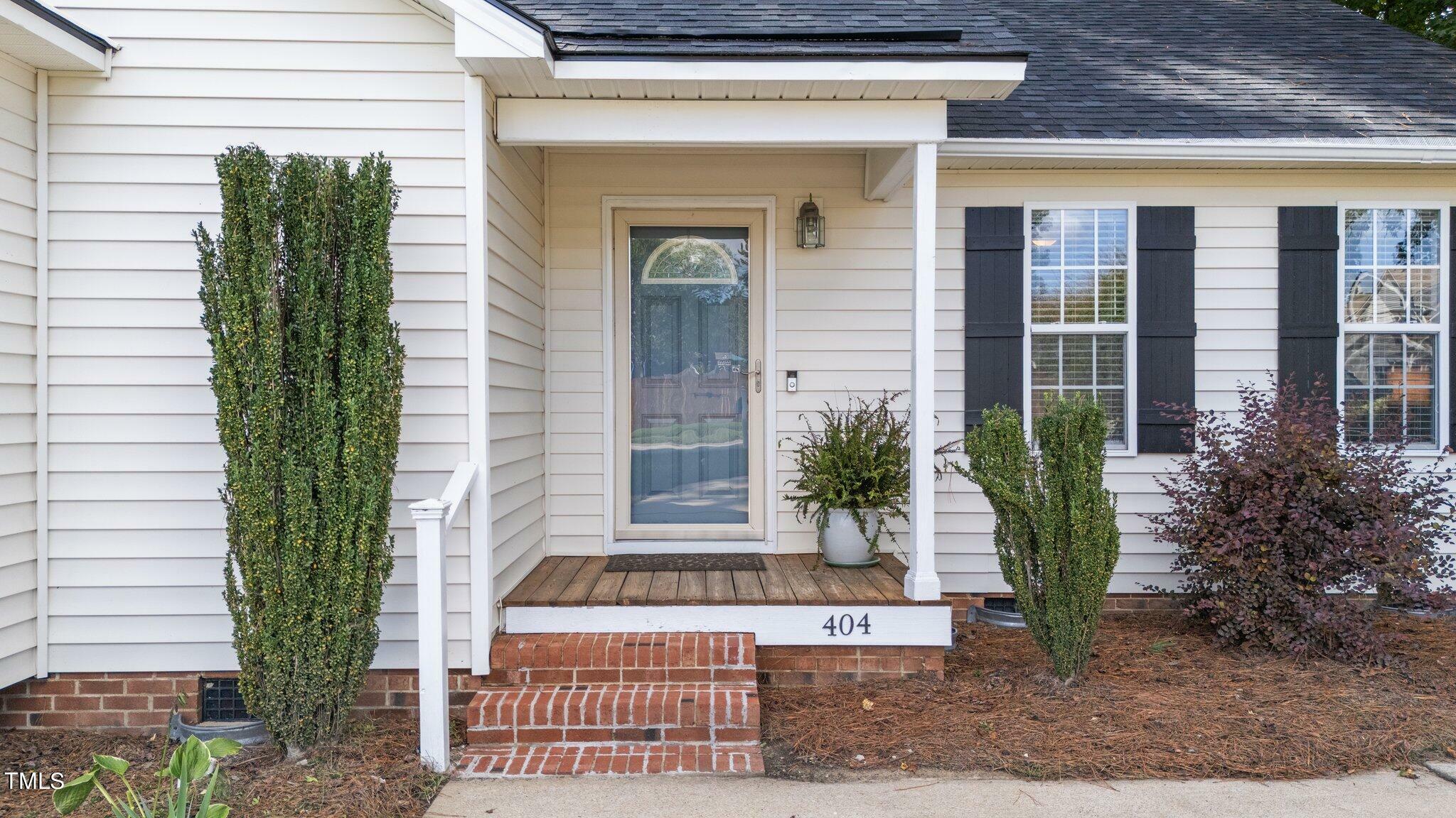 Property Photo:  404 Pinecroft Drive  NC 27520 