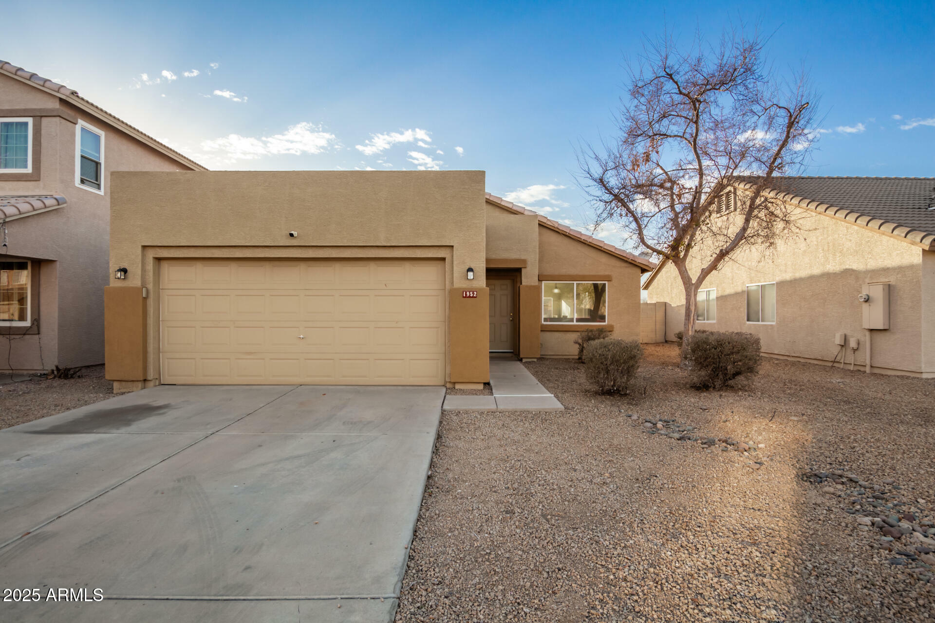 Property Photo:  1952 N 103rd Drive  AZ 85392 