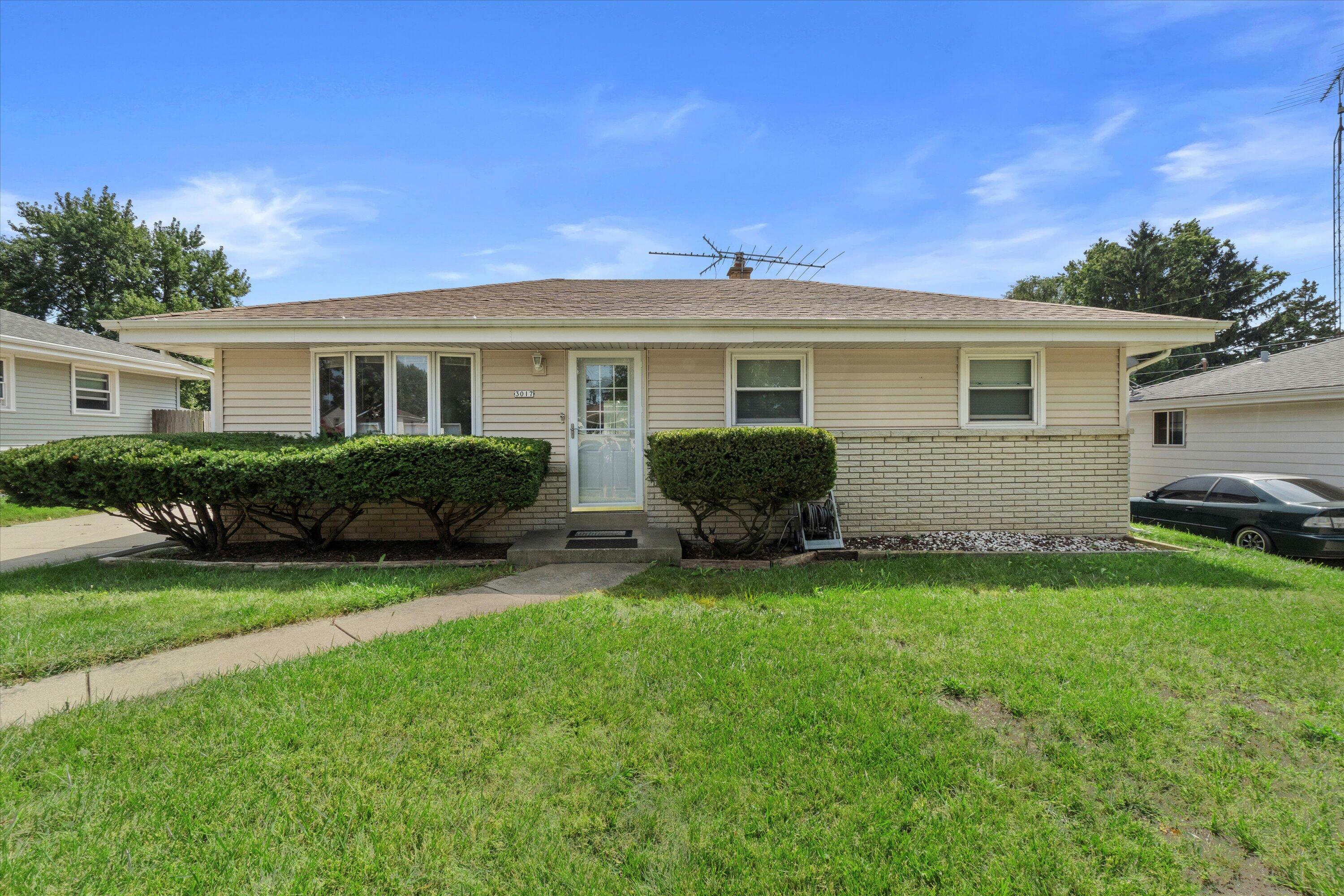 Property Photo:  3017 E Belsar Ave  WI 53110 