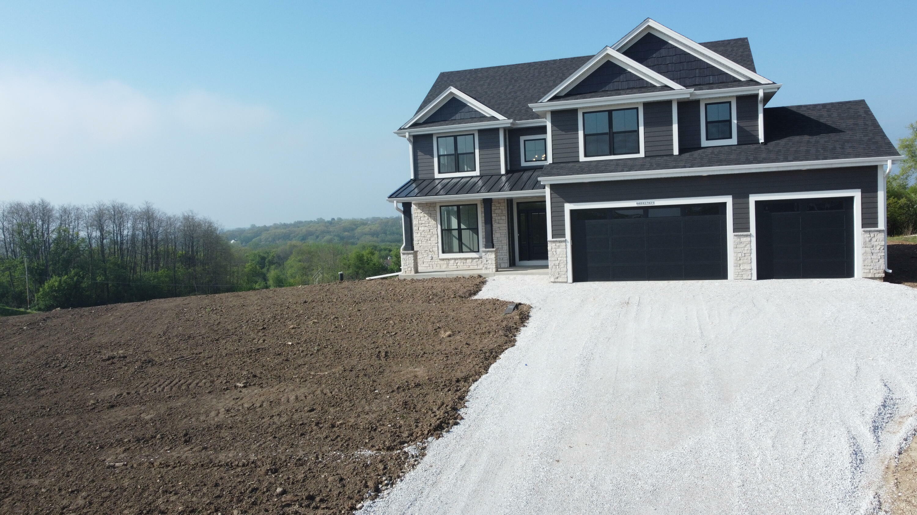 Property Photo: N48w27431 S Willow Creek Dr WI 53072