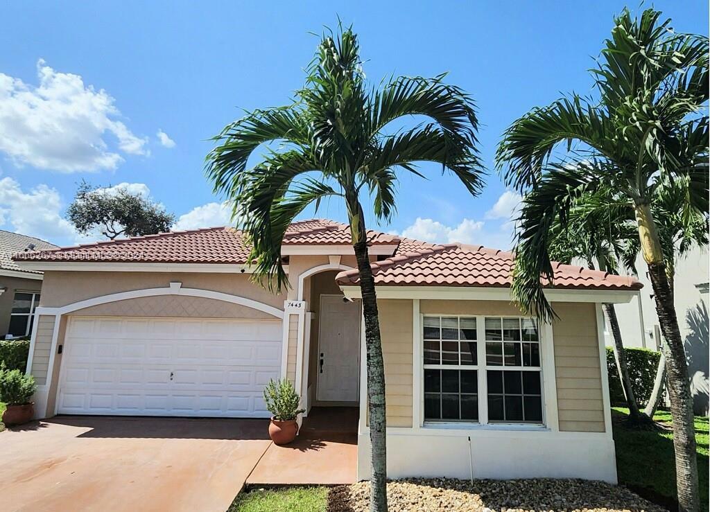 Property Photo:  7443 NW 70th Ave  FL 33067 