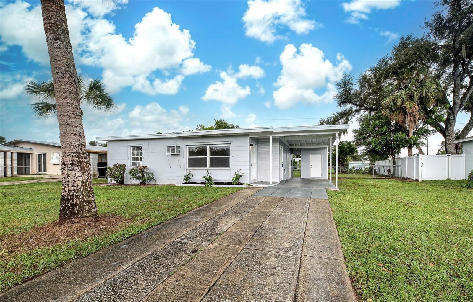 Property Photo: 2513 Elkcam Boulevard FL 33952