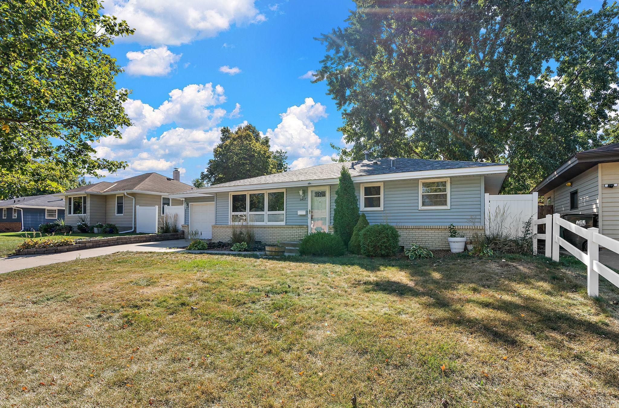 Property Photo:  6407 61st Avenue N  MN 55428 