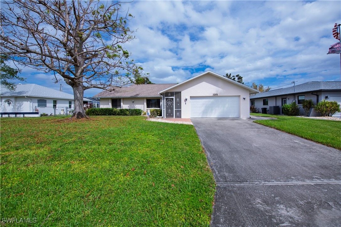 Property Photo:  1201 SE 23rd Street  FL 33990 