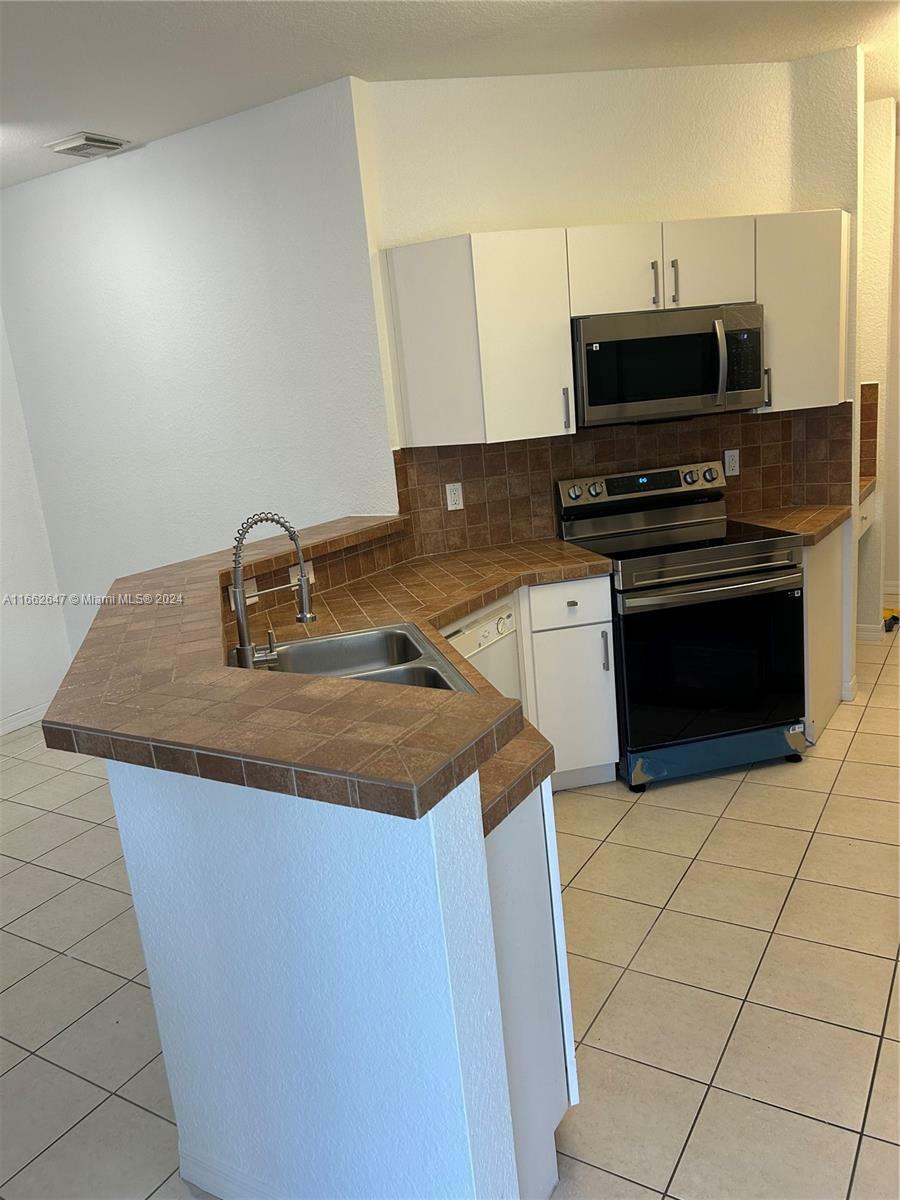 Property Photo:  13772 SW 118th Ter  FL 33186 