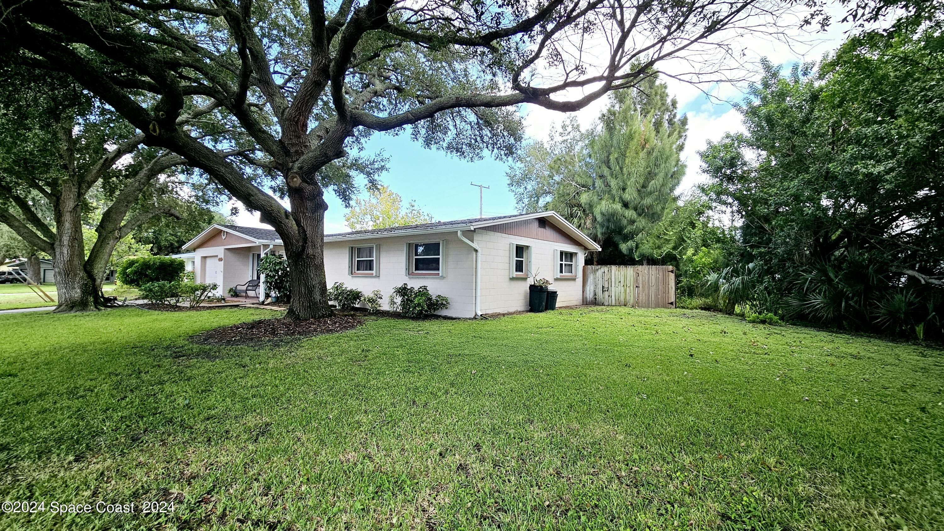 Property Photo:  100 N Tropical Way  FL 32952 