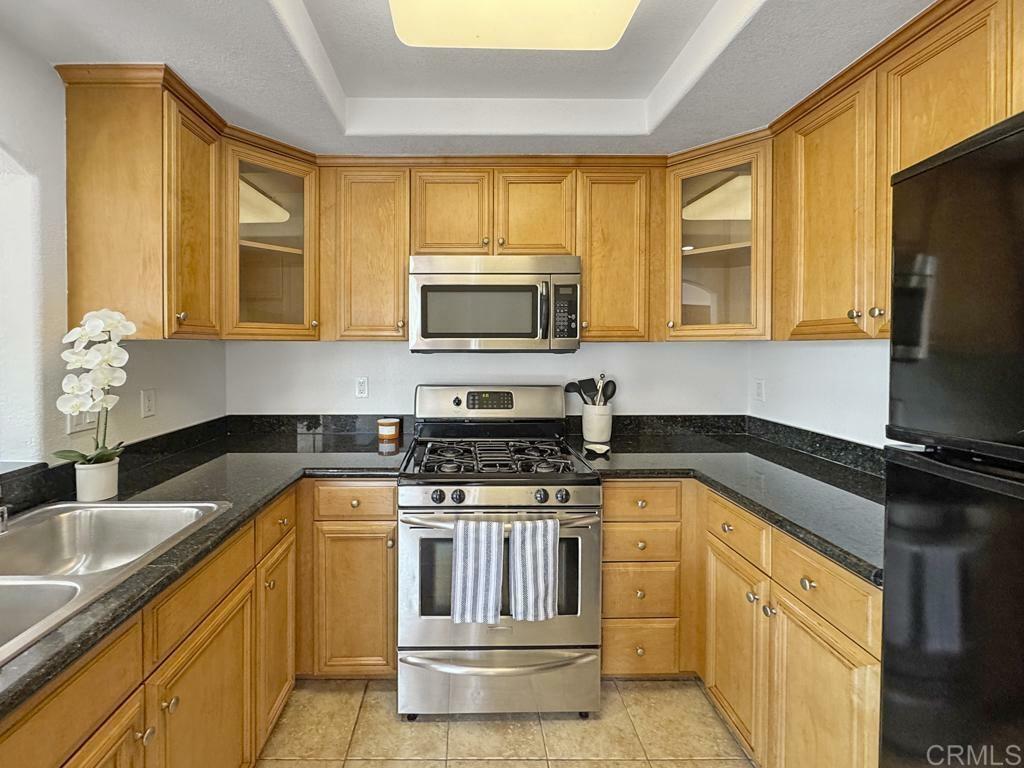 Property Photo:  5010 Los Morros Way 23  CA 92057 