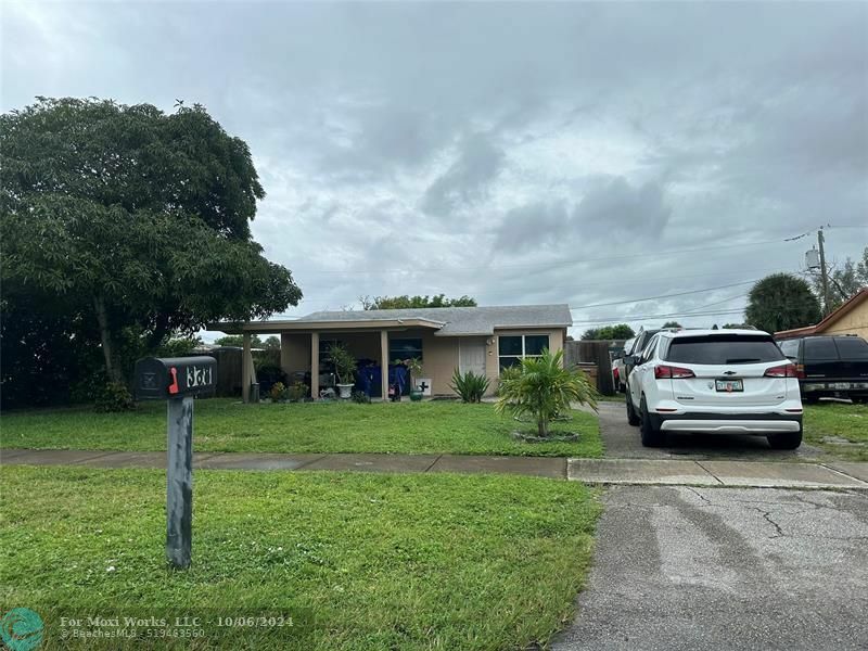 Property Photo:  338 NW 4th Pl  FL 33441 