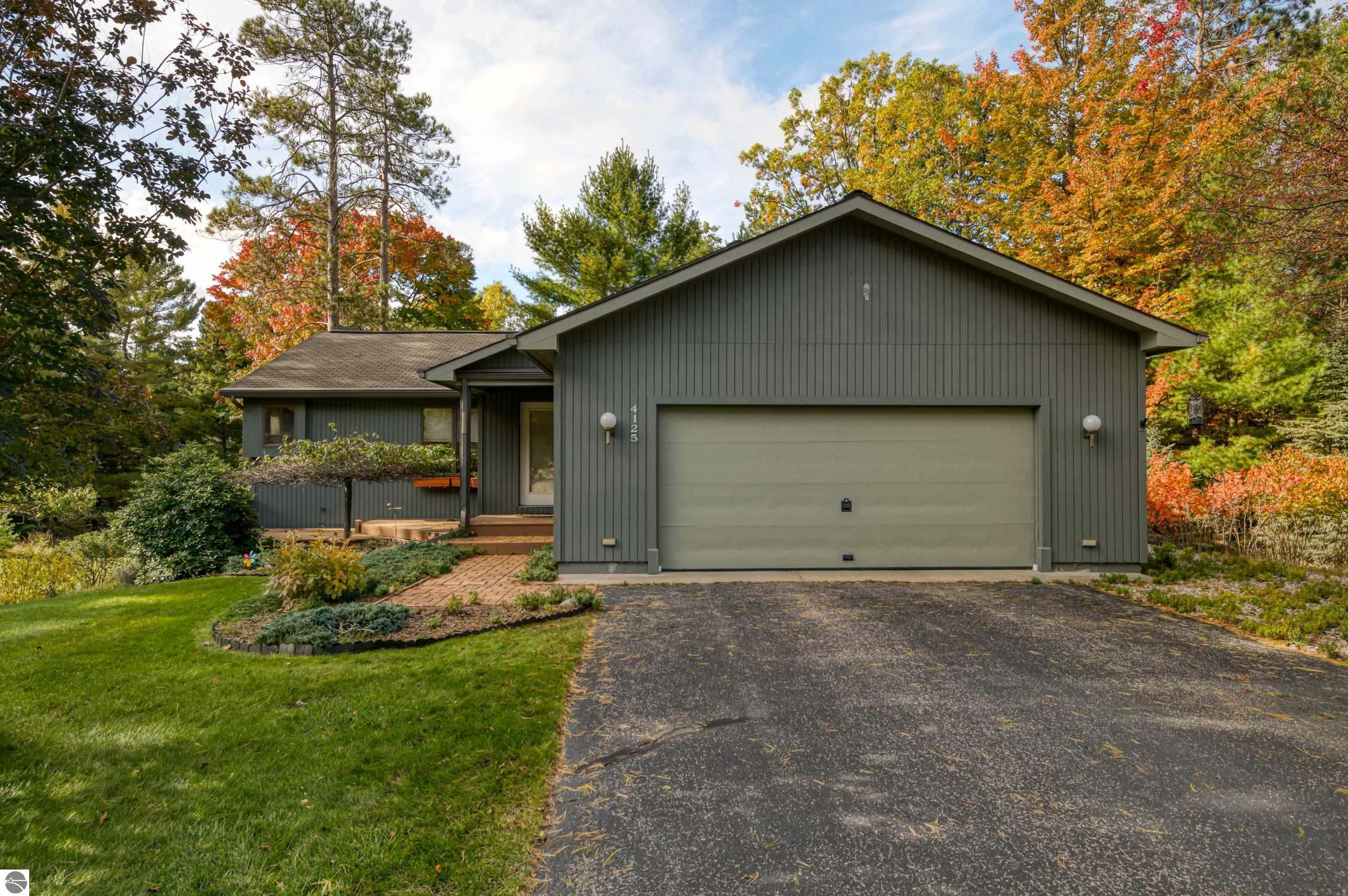 Property Photo:  4125 Holiday North Court  MI 49686 