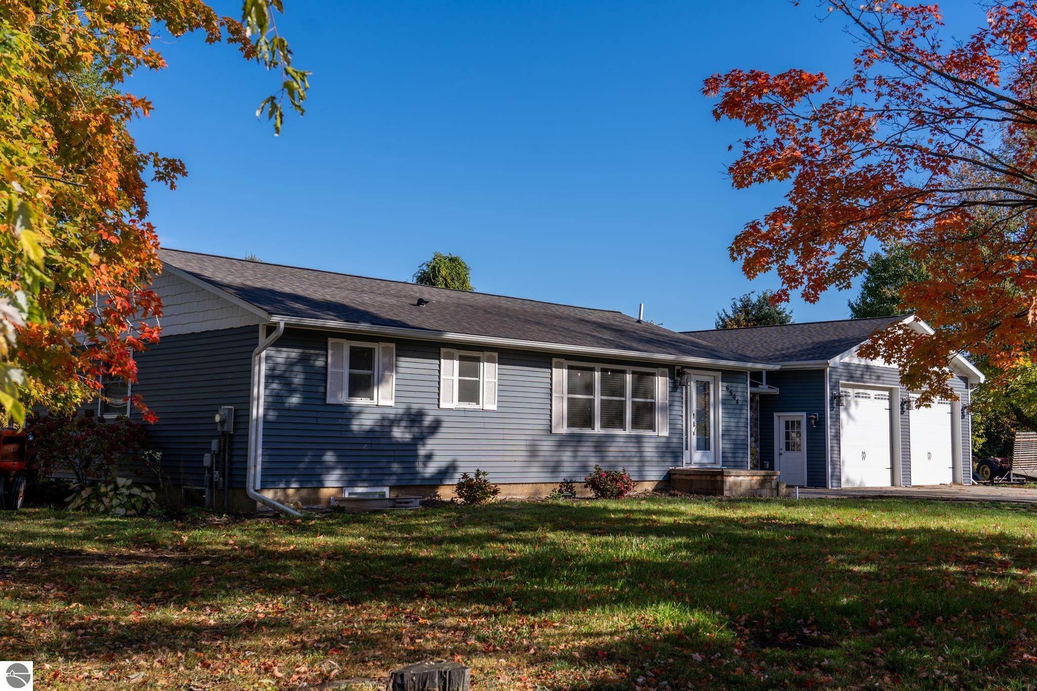 Property Photo:  6504 Bellinger Drive  MI 48858 