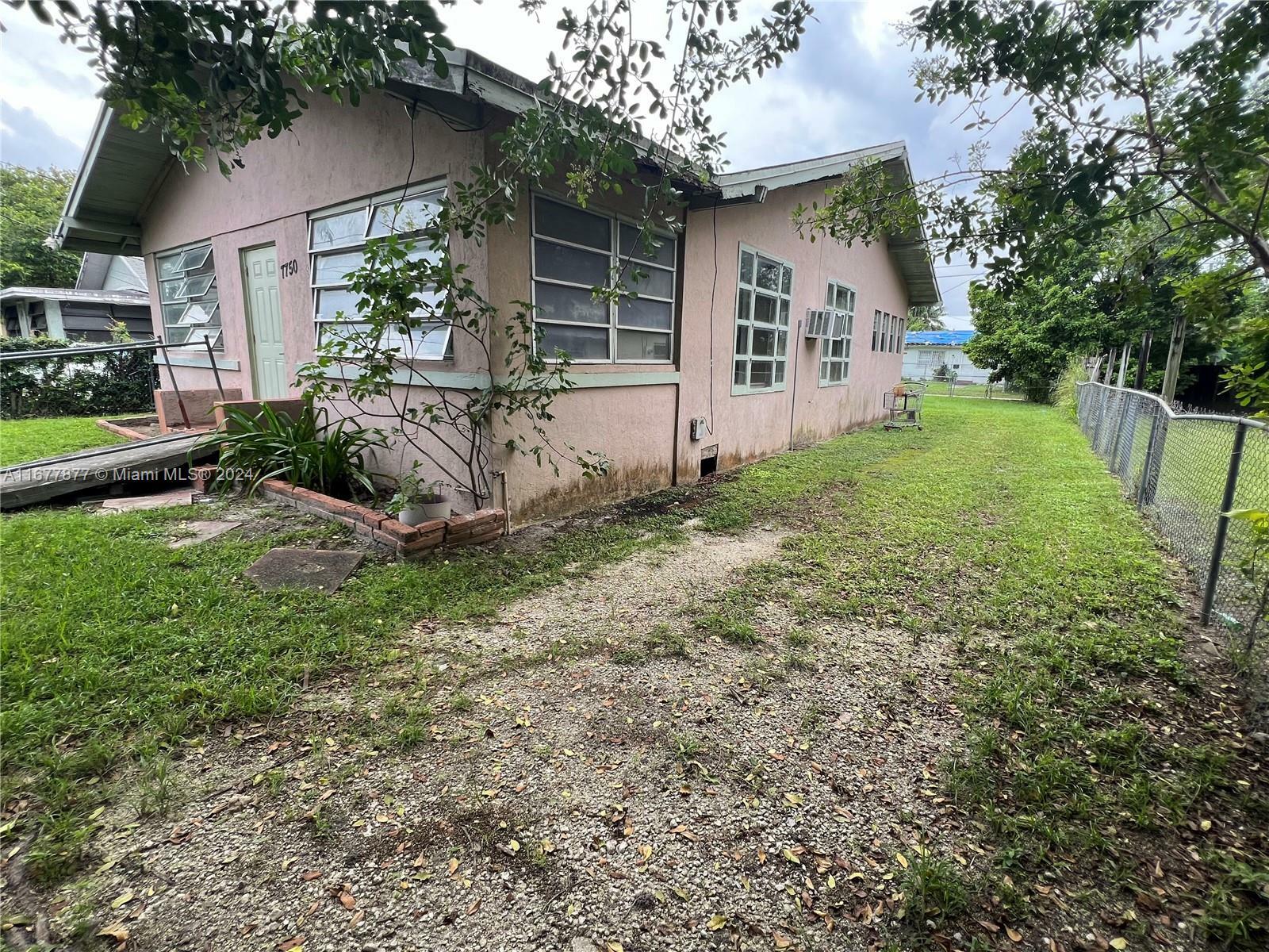 Property Photo:  7750 NW Miami Pl  FL 33150 