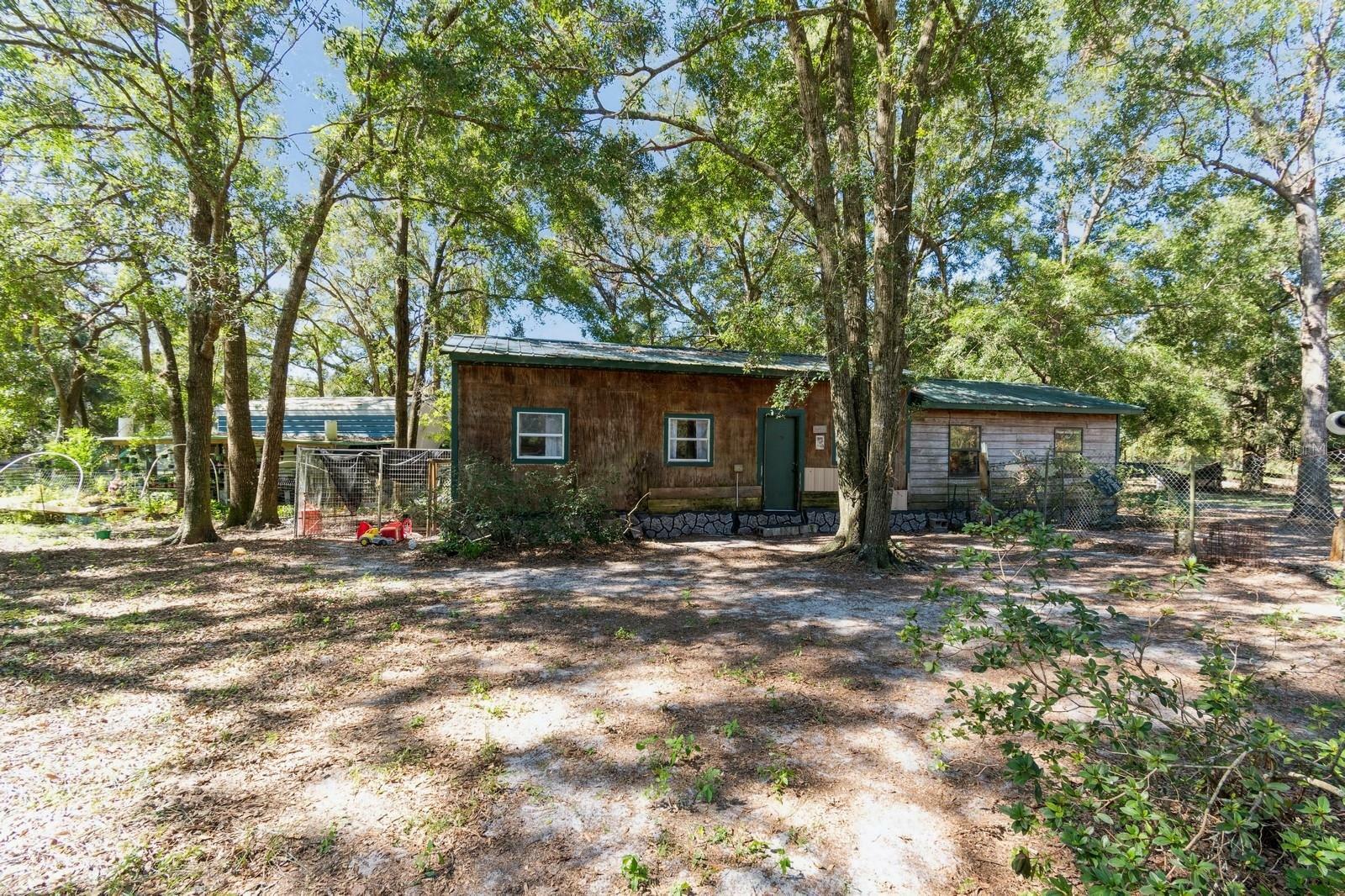 Property Photo:  250 NE 660th Street  FL 32680 