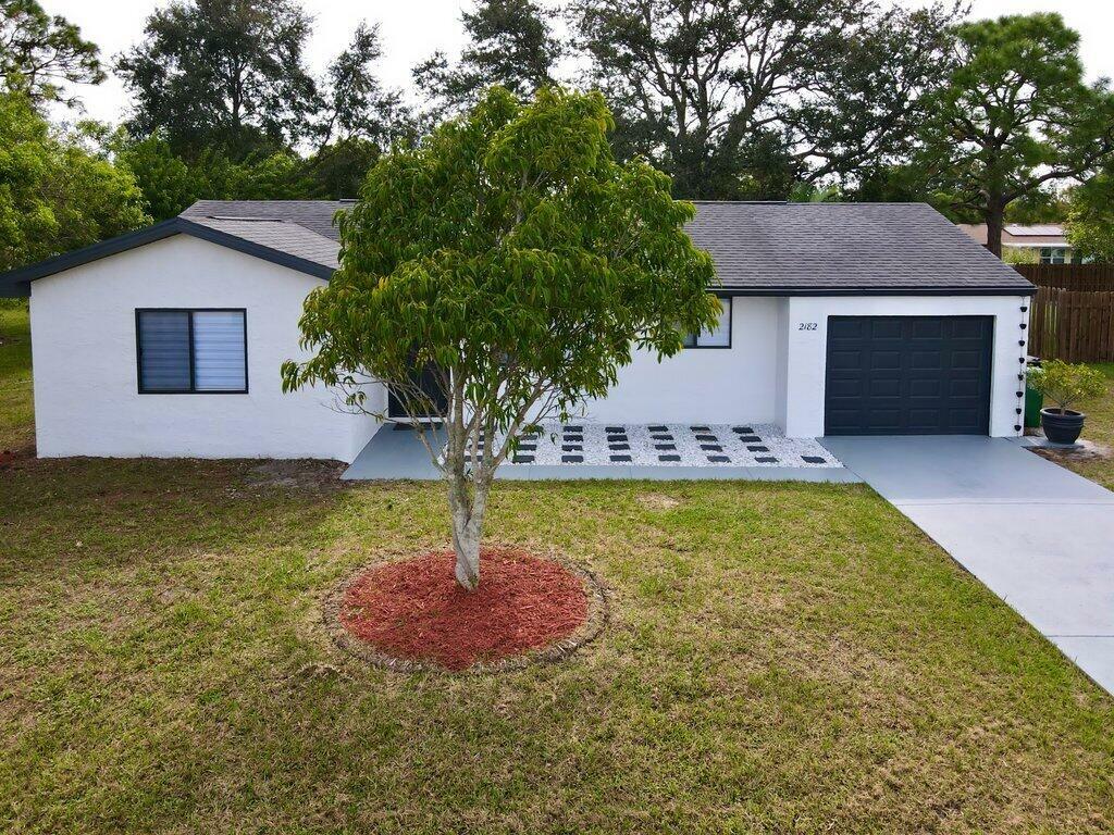 Property Photo:  2182 SE Genoa Street  FL 34952 