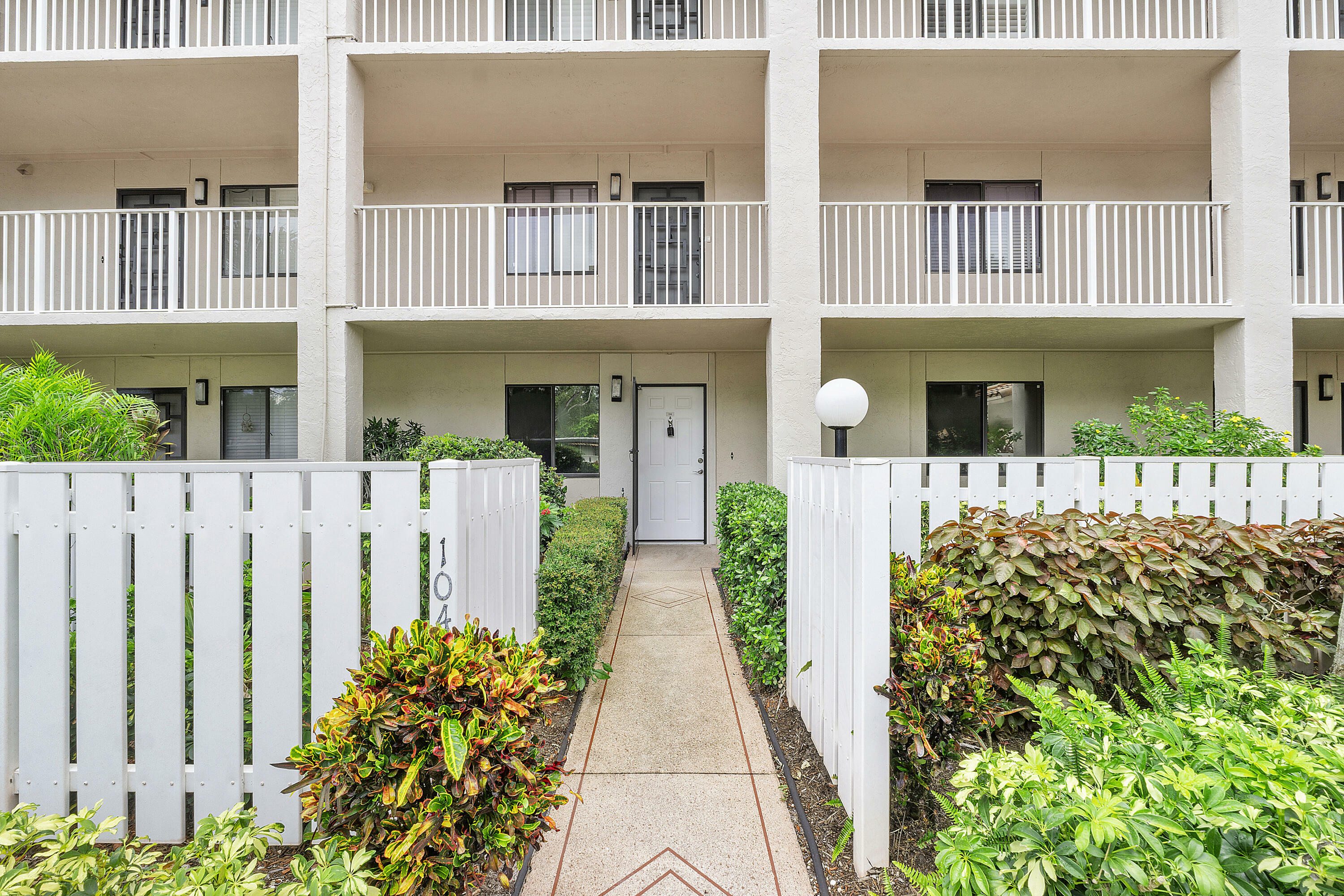 Property Photo:  6121 Pointe Regal Circle 104  FL 33484 