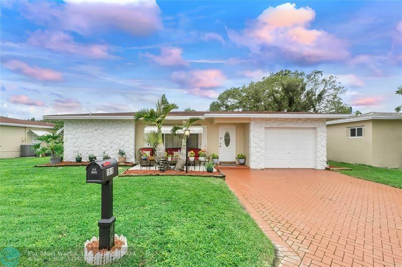 Property Photo:  1510 NW 48th Pl  FL 33064 