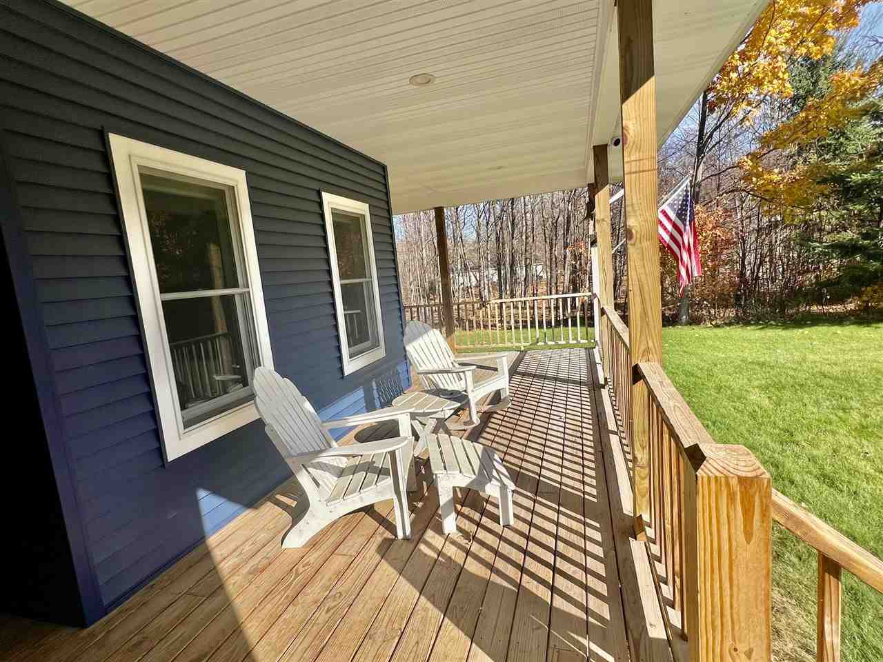 Property Photo:  8075 Major Douglas Sloan  MI 49720 