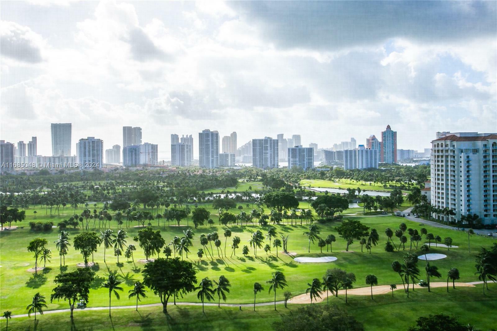 Property Photo: 20301 W Country Club Dr 1927 FL 33180