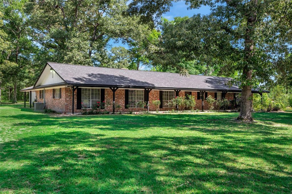 Property Photo:  206 N Duck Creek Road  TX 77328 