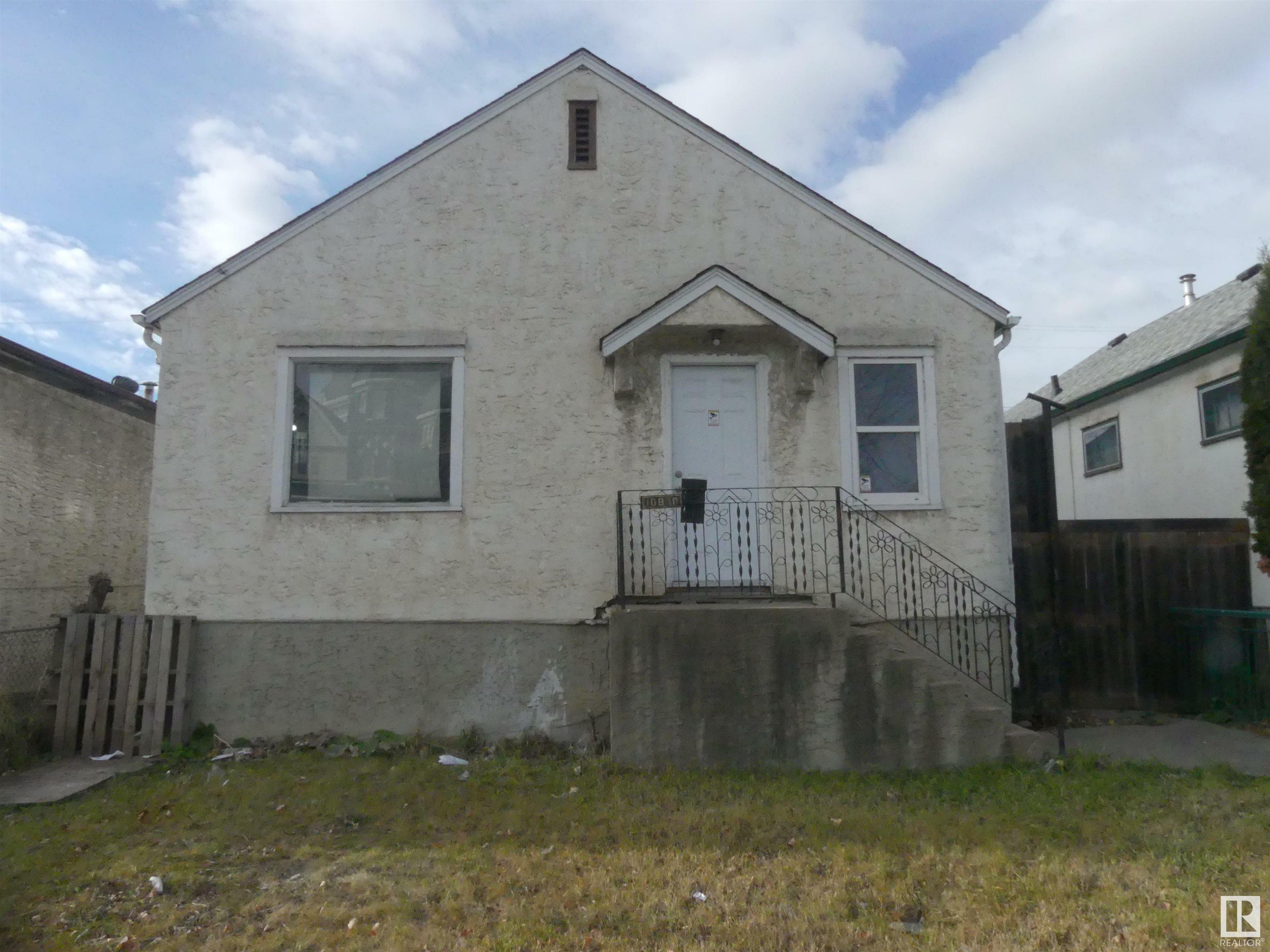 Property Photo:  10840 97 Street NW  AB T5H 2M3 