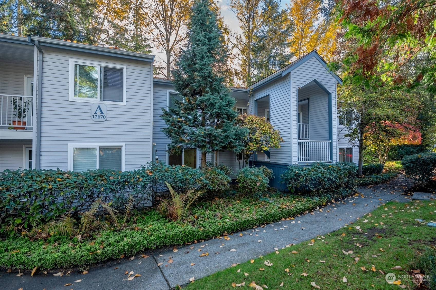 Property Photo:  12670 NE 10th Place A 103  WA 98005 