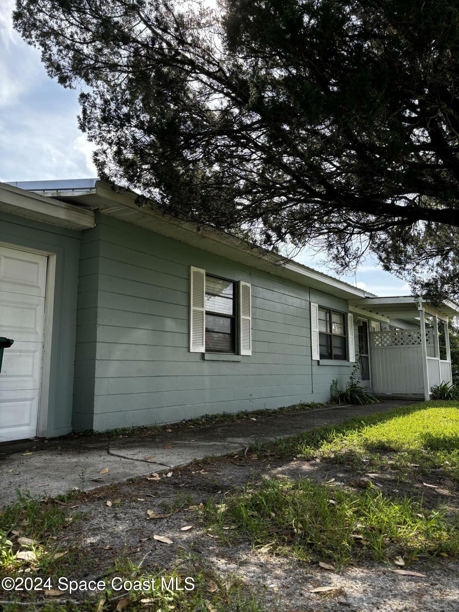 Property Photo:  122 Laurel Oak Street  FL 32904 