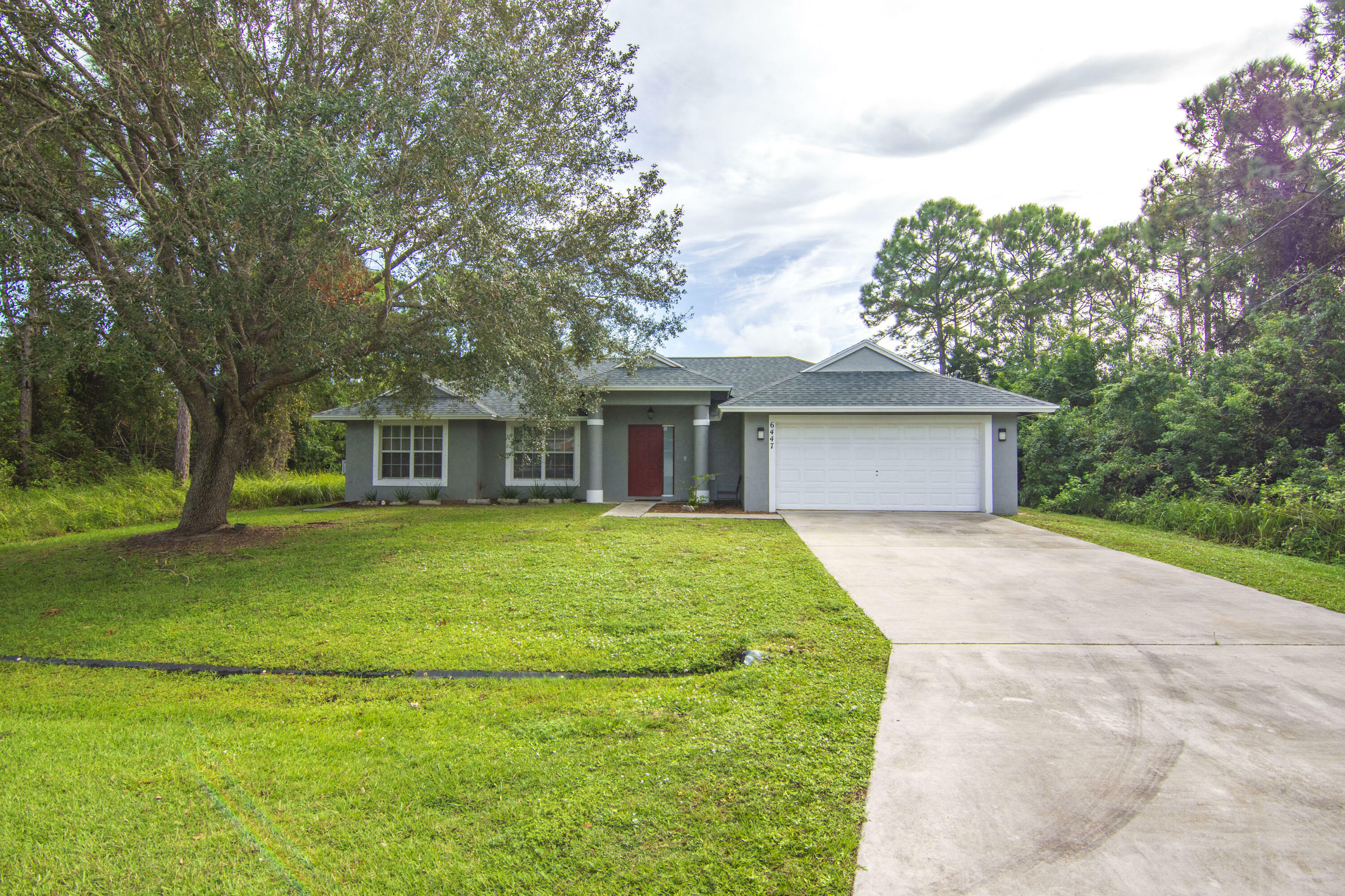 Property Photo:  6447 NW Foxglove Street  FL 34986 