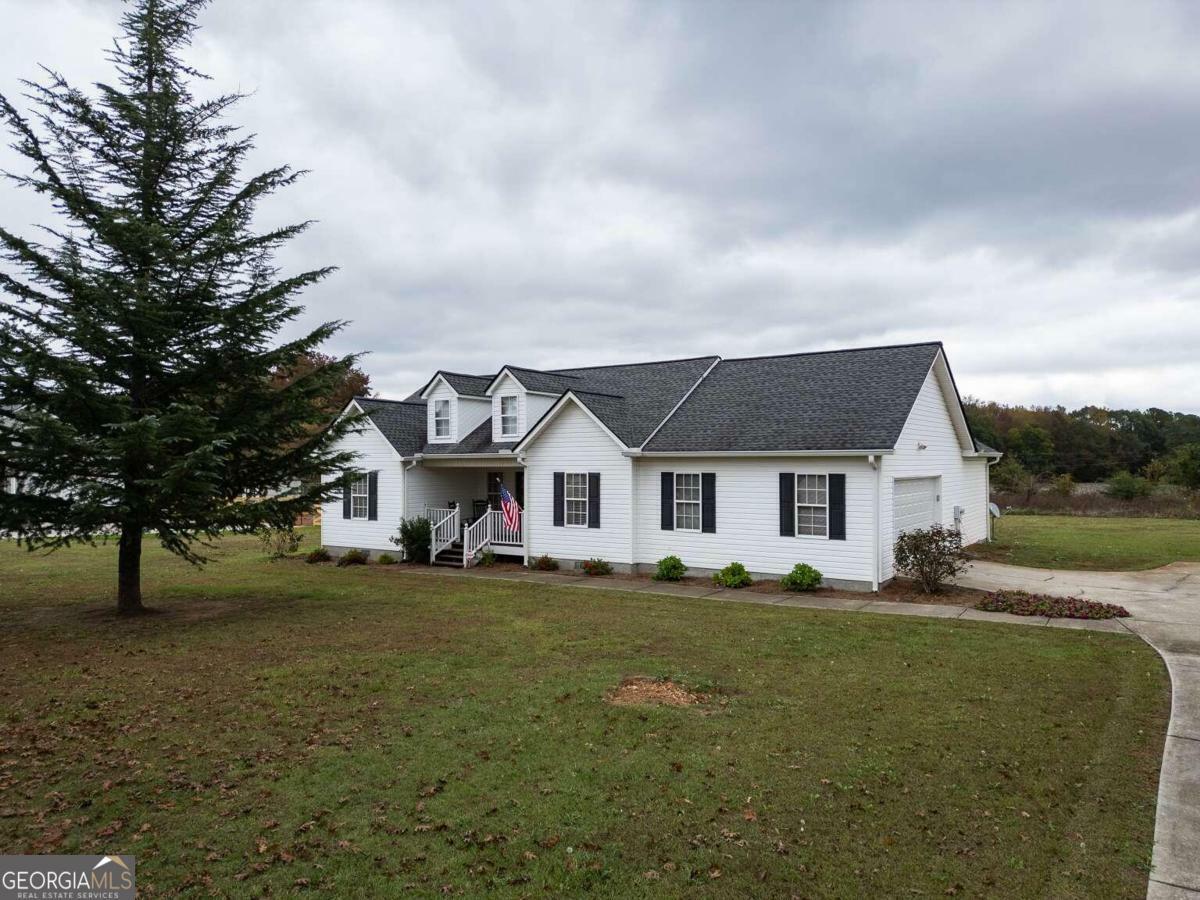 Property Photo:  128 Queens Cemetery Road  GA 30641 