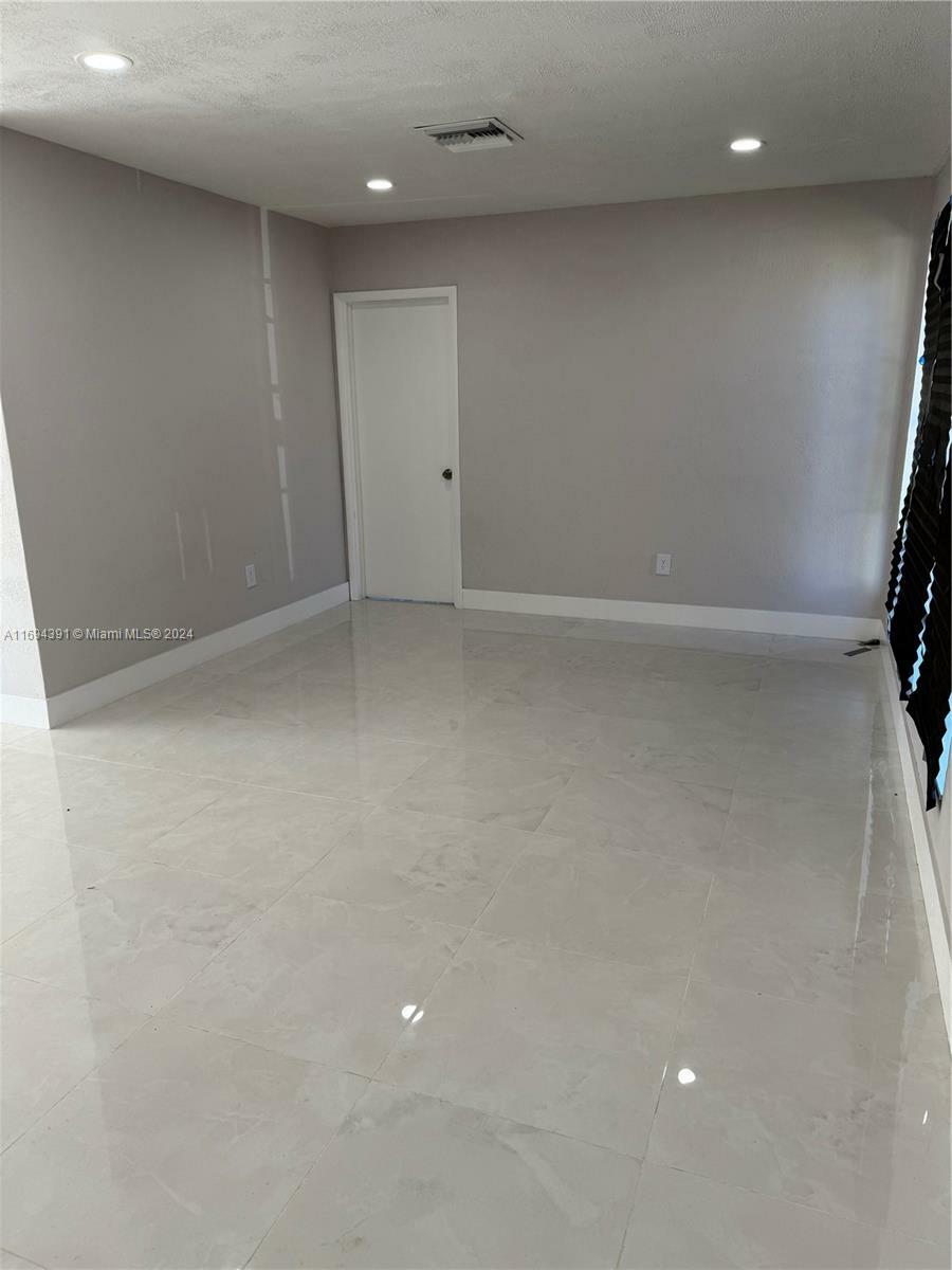 Property Photo:  954 W 72nd Pl  FL 33014 