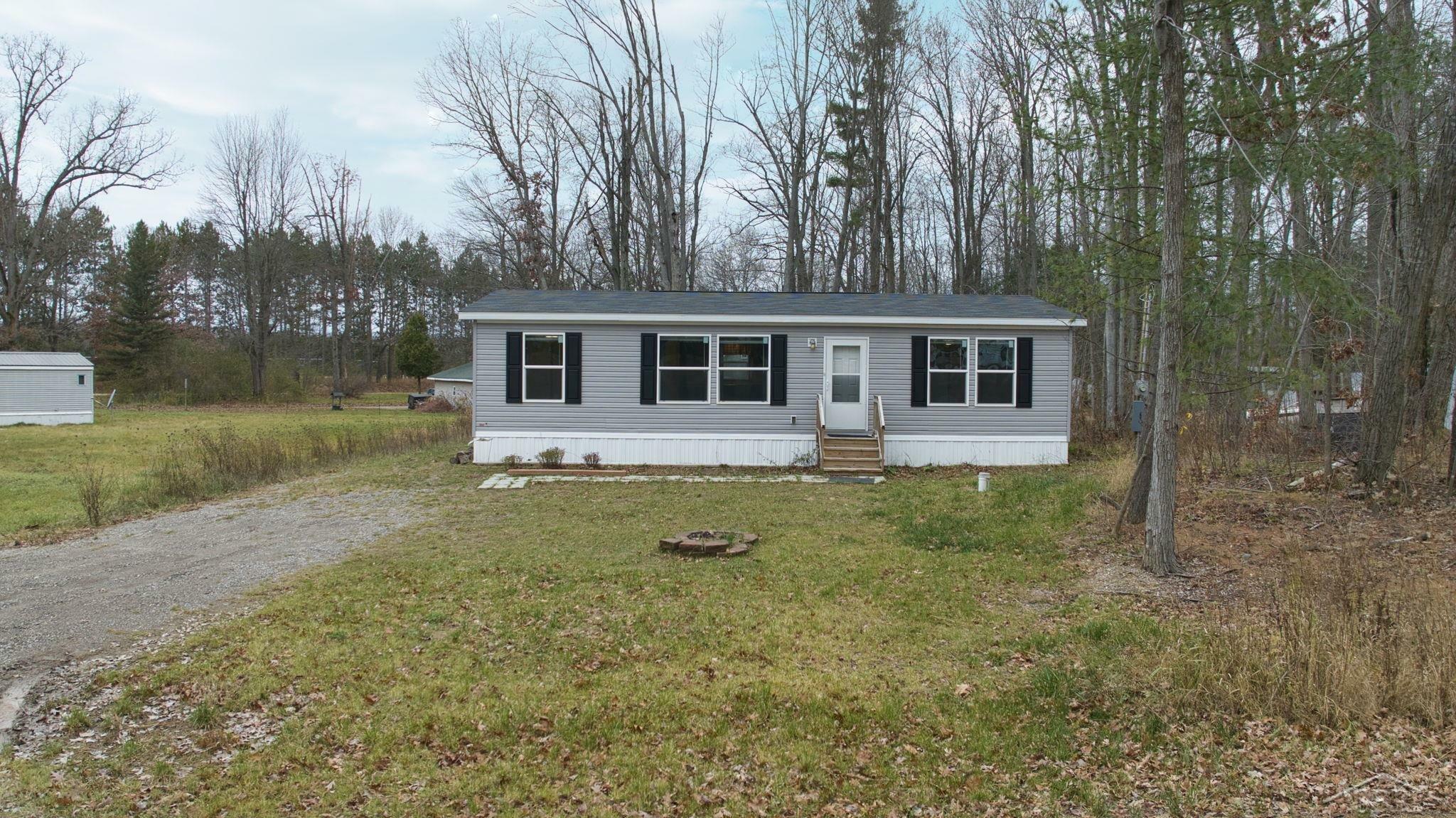 Property Photo:  7942 N Airpark Road  MI 48893 