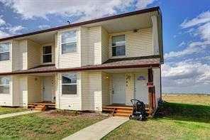 Property Photo:  1201 Eagleview Place NW  AB T1V 1Y8 