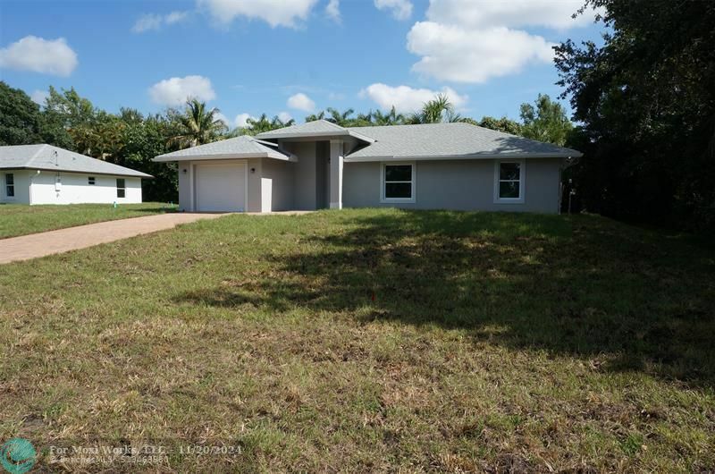 Property Photo:  10807 Barn Rd  FL 33449 