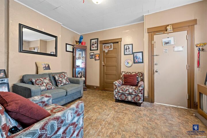 Property Photo:  66-42 Forest Avenue  NY 11385 