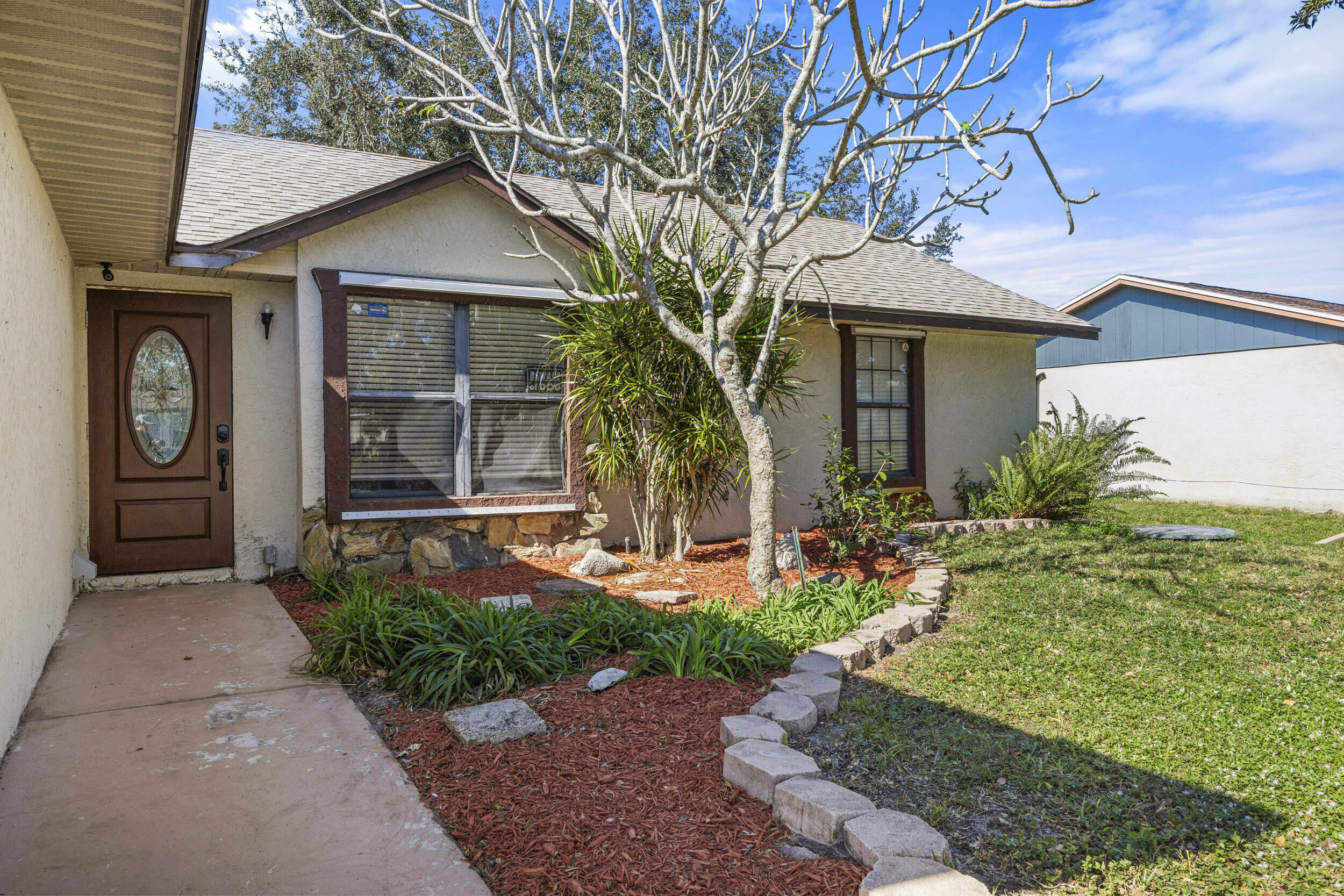 Property Photo: 2442 SW Lafayette Street FL 34984