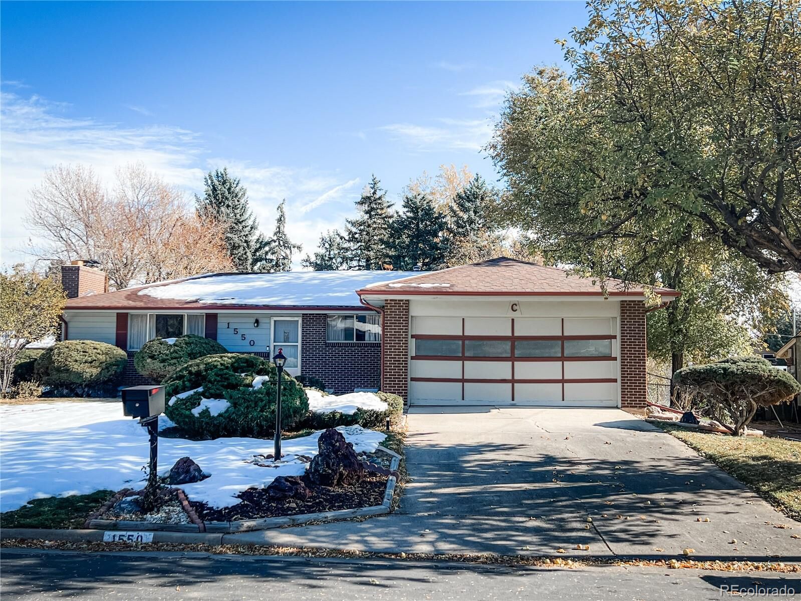 Property Photo:  1550 S Newland Street  CO 80232 