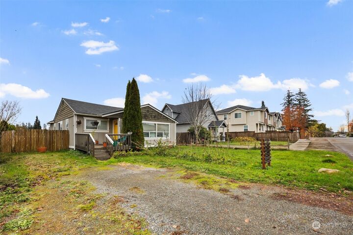 Property Photo:  629 E 57th Street  WA 98404 