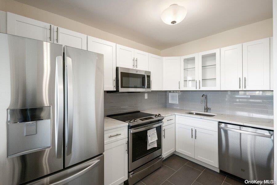 Property Photo: 7-24 166th Street 9C NY 11357