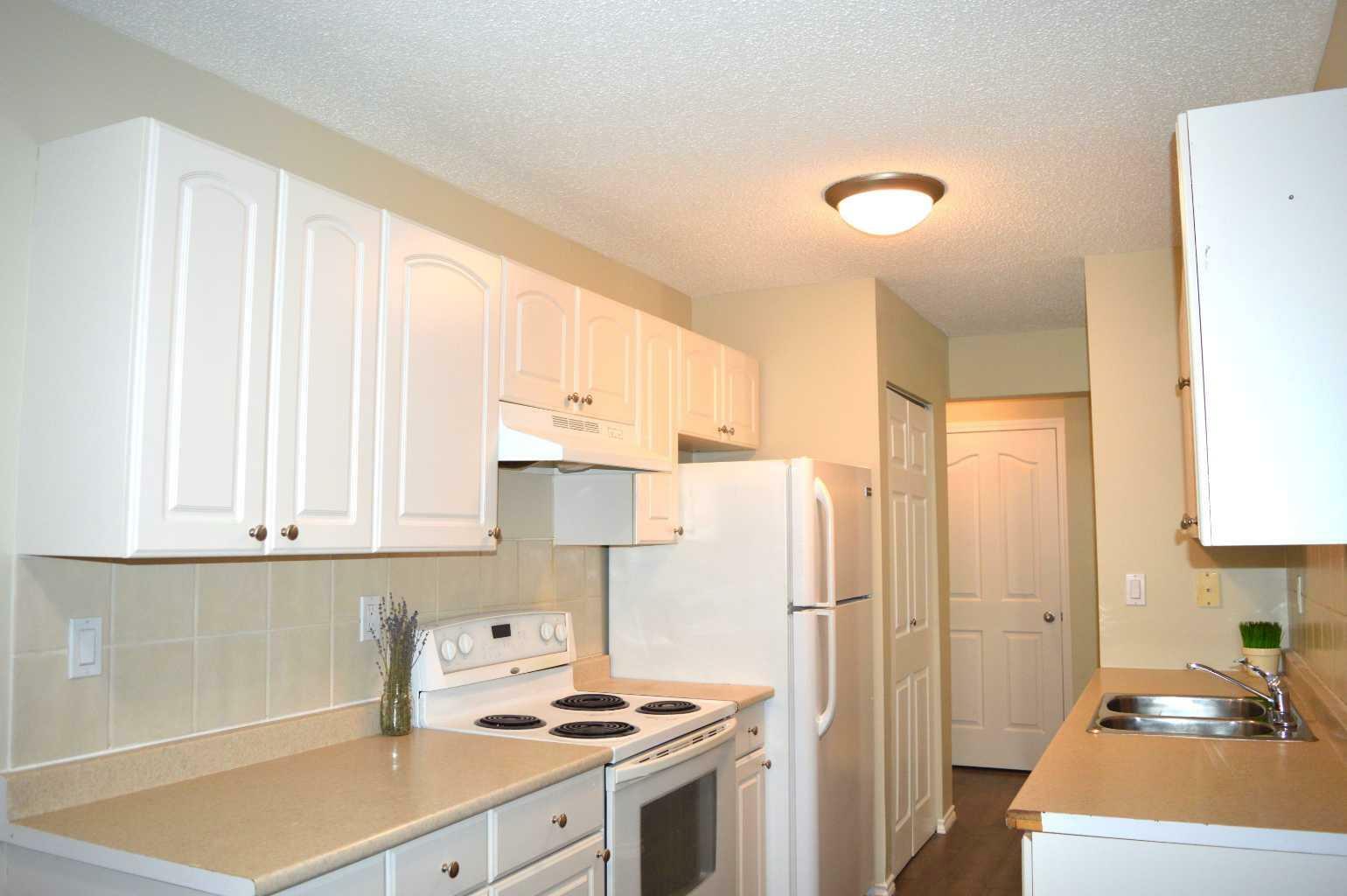 Property Photo:  4904 54 Street 105  AB T8N 5G7 