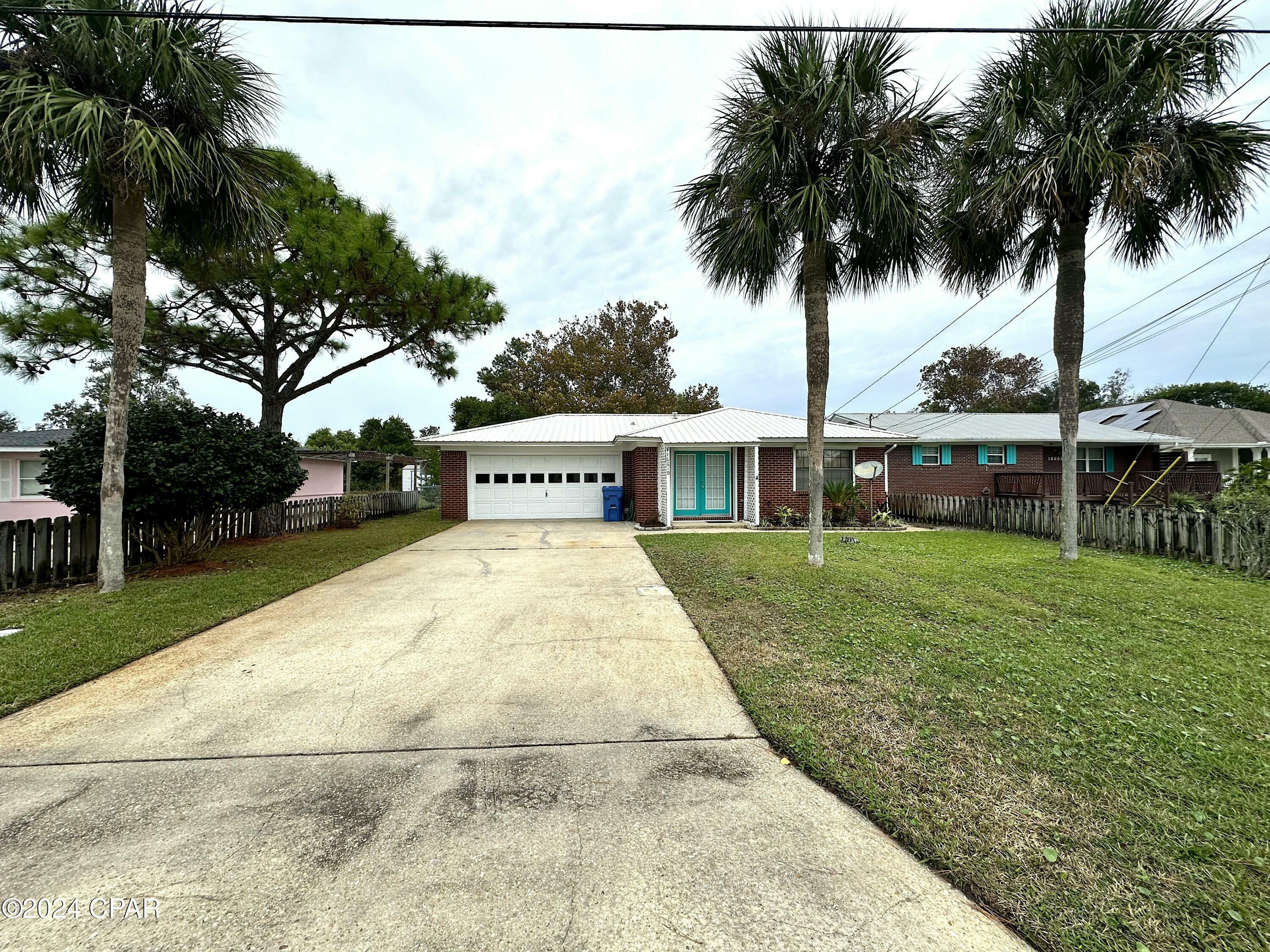 Property Photo:  16810 Junipero Avenue  FL 32413 