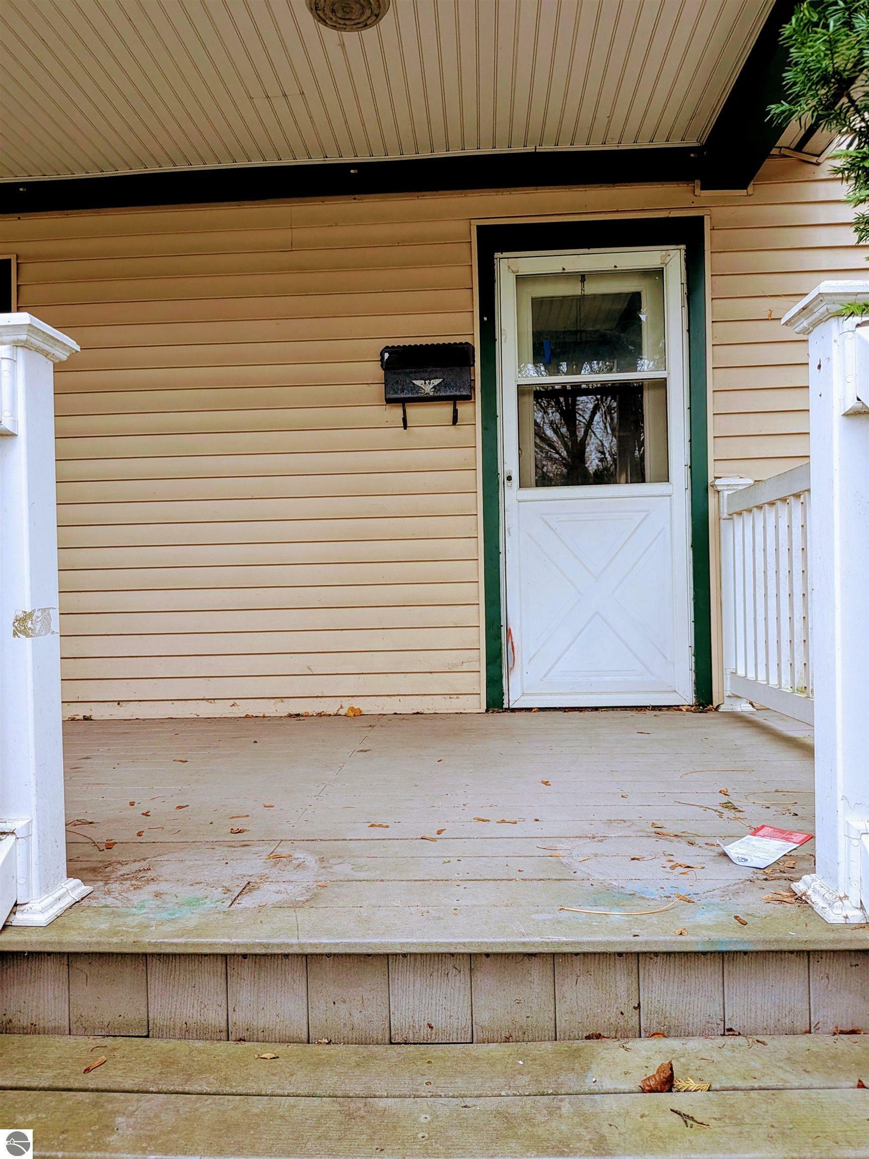 Property Photo:  708 E Wisconsin  MI 48858 