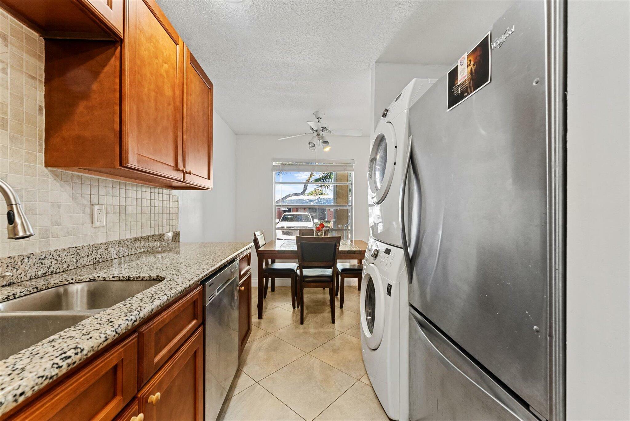 Property Photo:  1560 NW 18th Avenue 101  FL 33445 